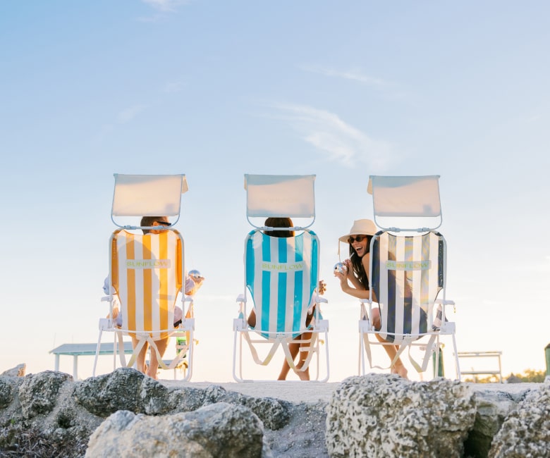 3 chairs facing backwards